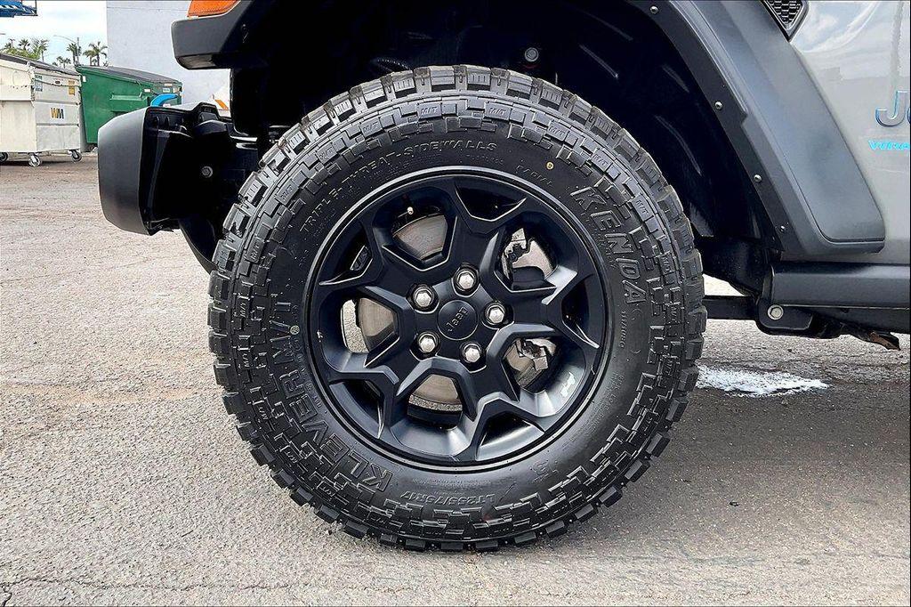 used 2023 Jeep Wrangler 4xe car, priced at $27,221