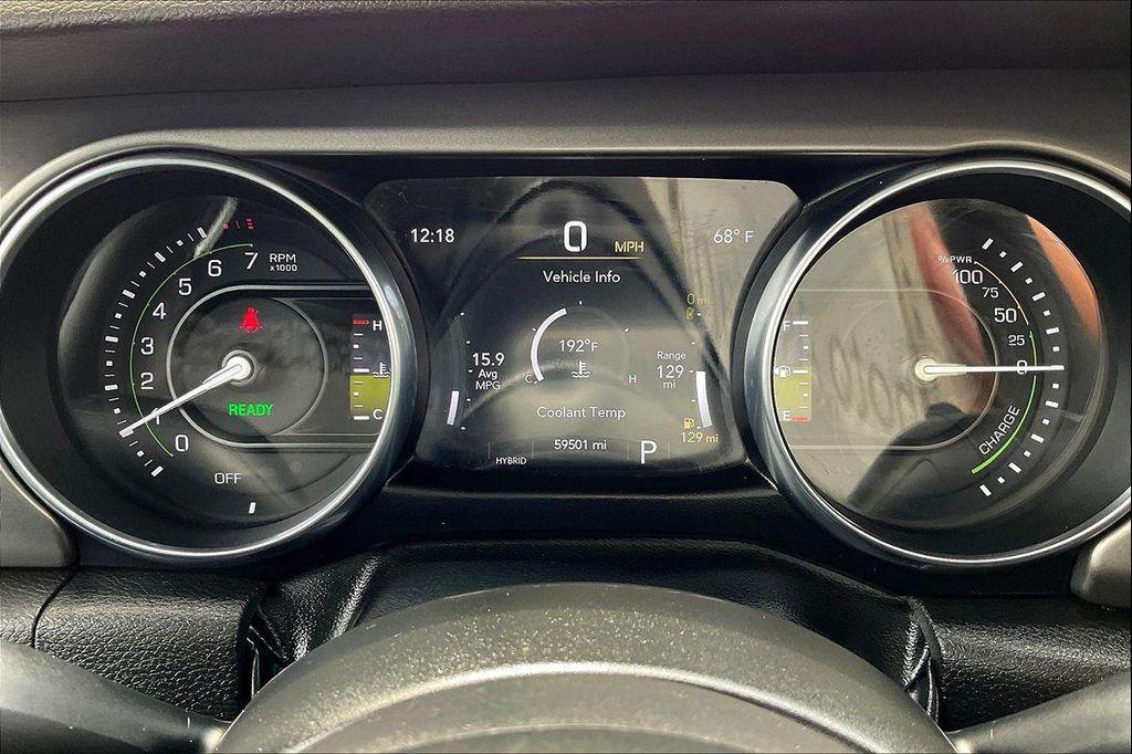 used 2023 Jeep Wrangler 4xe car, priced at $27,221