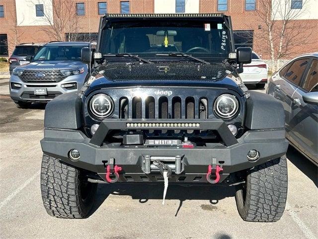 used 2016 Jeep Wrangler Unlimited car, priced at $22,029