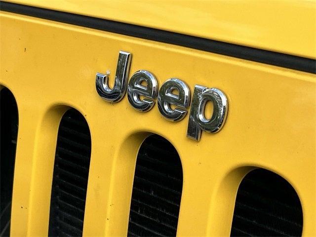 used 2015 Jeep Wrangler Unlimited car, priced at $19,905