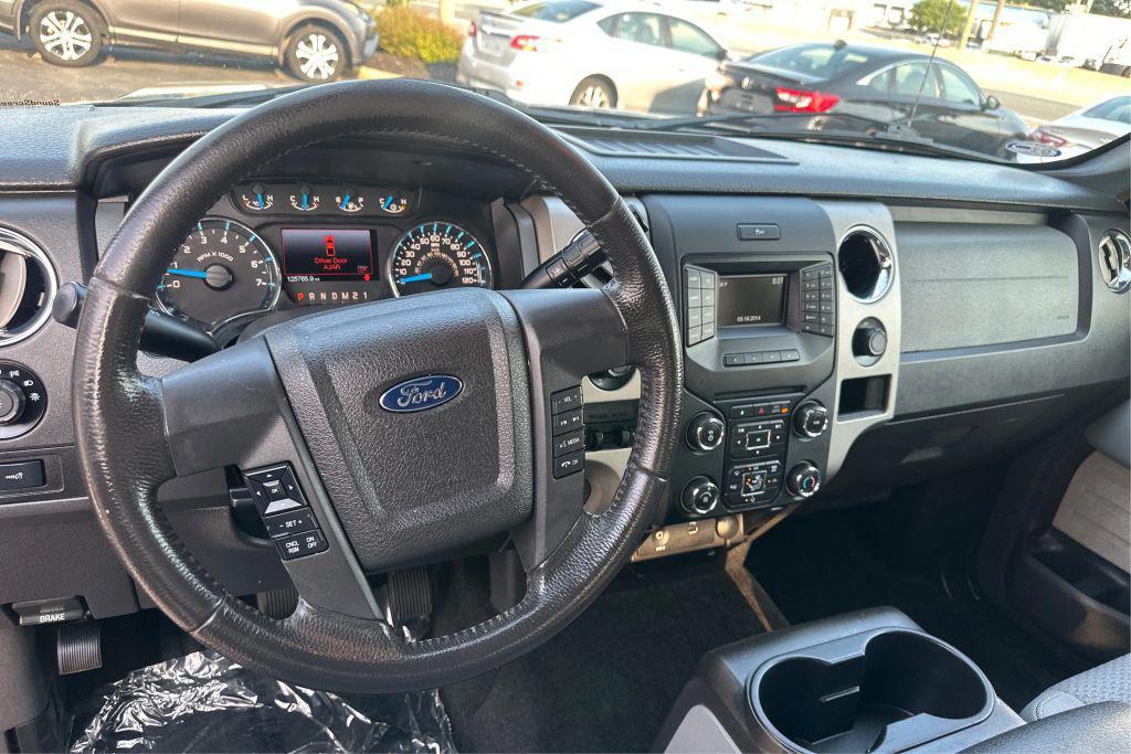 used 2014 Ford F-150 car, priced at $16,990