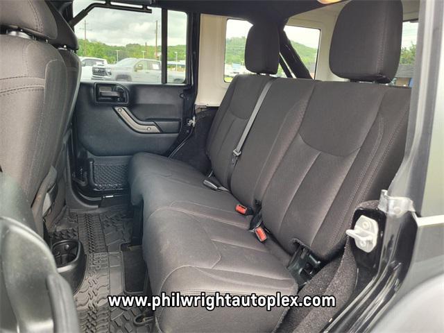 used 2018 Jeep Wrangler JK Unlimited car, priced at $24,797