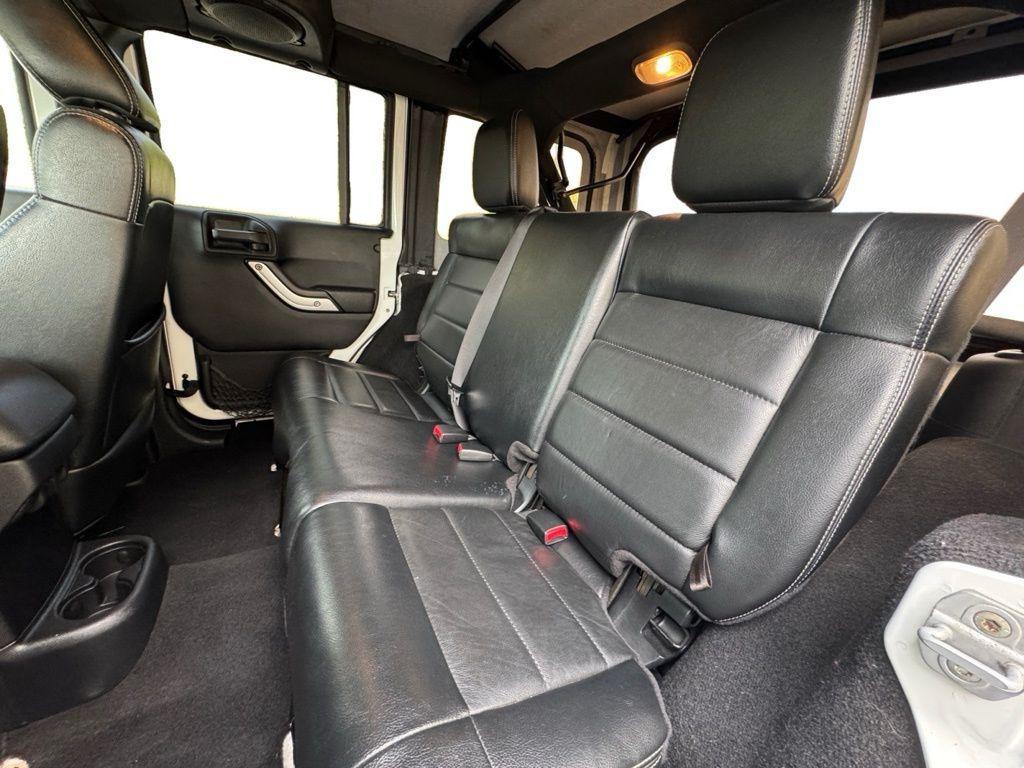 used 2012 Jeep Wrangler Unlimited car, priced at $12,895