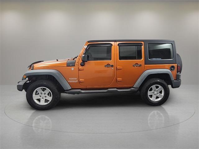 used 2011 Jeep Wrangler Unlimited car, priced at $13,999