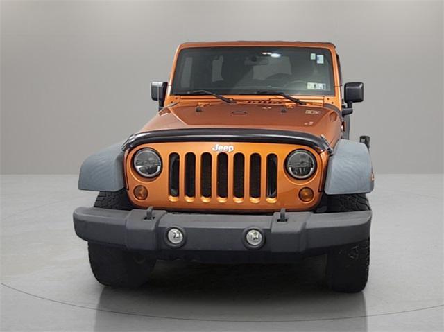 used 2011 Jeep Wrangler Unlimited car, priced at $13,999