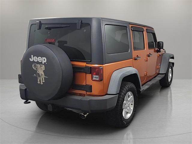 used 2011 Jeep Wrangler Unlimited car, priced at $13,999