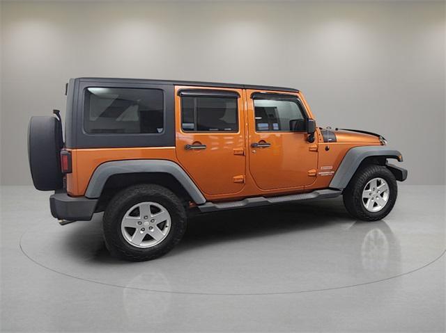 used 2011 Jeep Wrangler Unlimited car, priced at $13,999