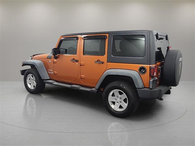 used 2011 Jeep Wrangler Unlimited car, priced at $13,999