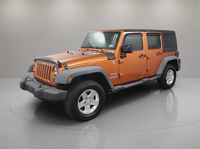 used 2011 Jeep Wrangler Unlimited car, priced at $13,999