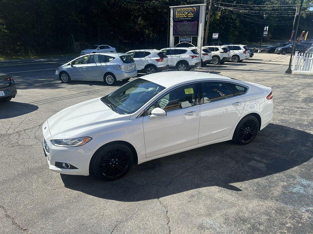 used 2016 Ford Fusion car, priced at $15,999