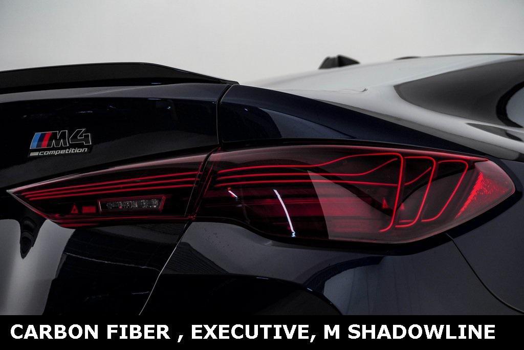 used 2025 BMW M4 car, priced at $89,700