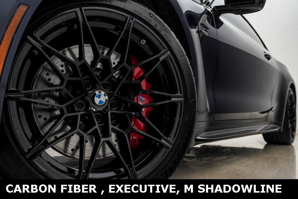 used 2025 BMW M4 car, priced at $89,700