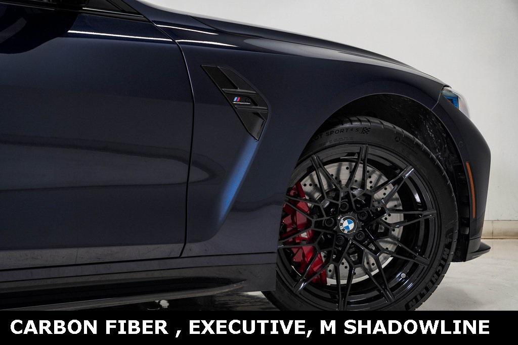 used 2025 BMW M4 car, priced at $89,700