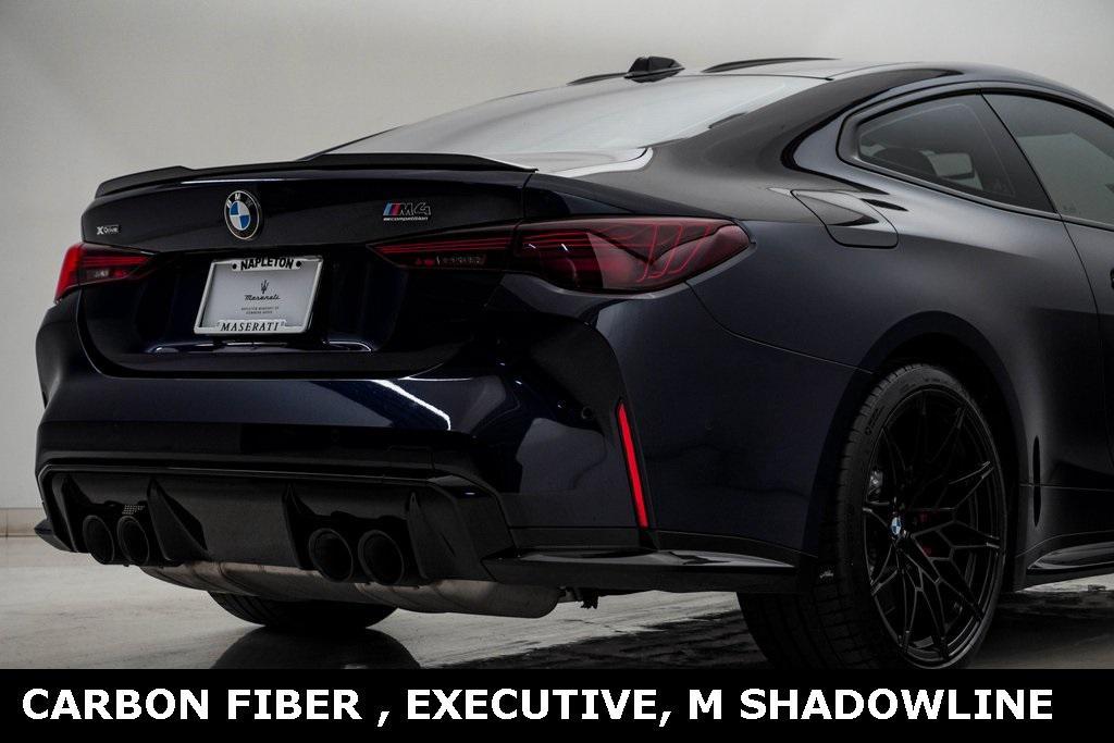 used 2025 BMW M4 car, priced at $89,700