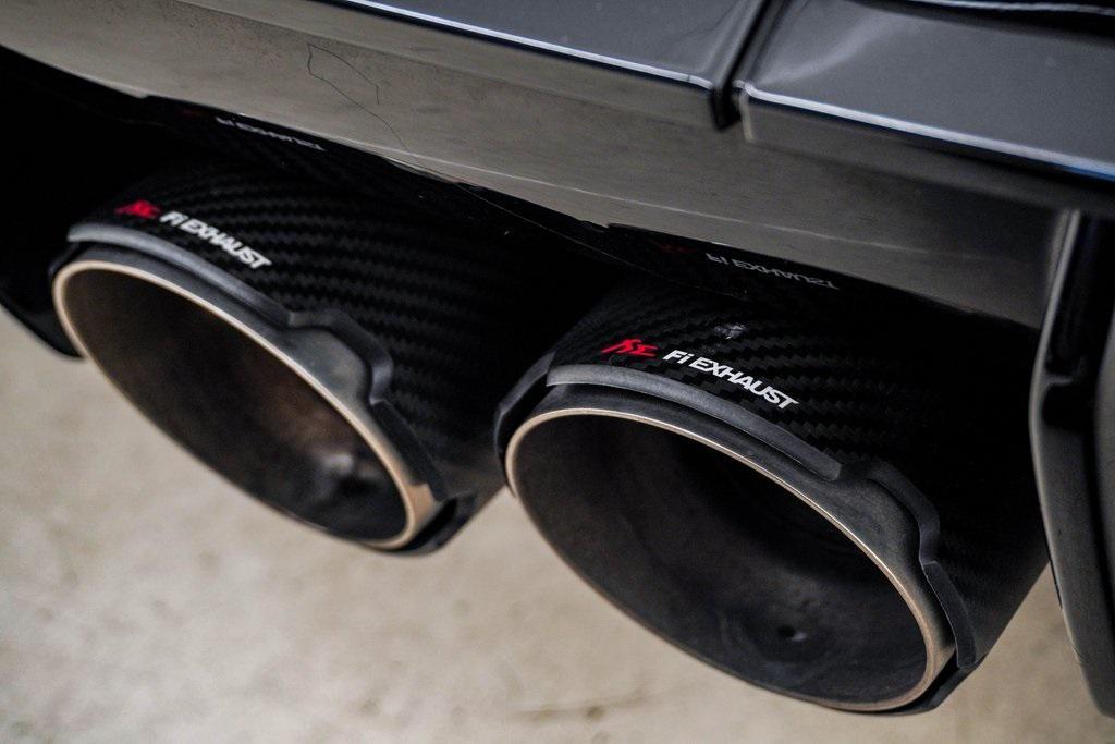 used 2023 BMW M4 car, priced at $76,800