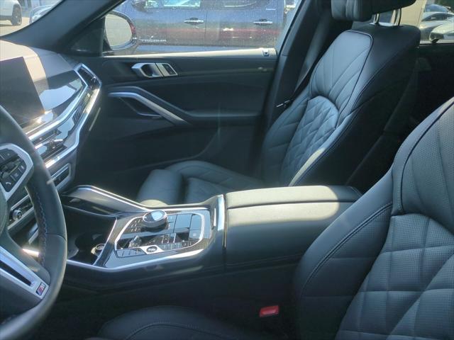 used 2025 BMW X6 car, priced at $93,800