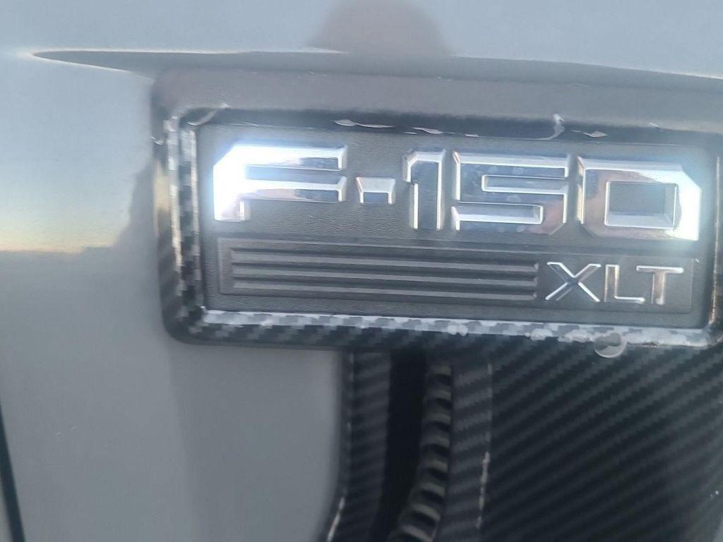 used 2021 Ford F-150 car, priced at $25,576