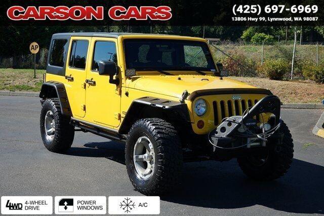 used 2011 Jeep Wrangler Unlimited car, priced at $15,995