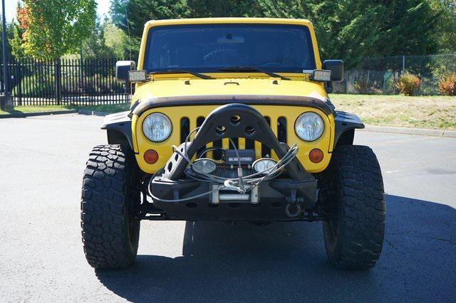 used 2011 Jeep Wrangler Unlimited car, priced at $15,995