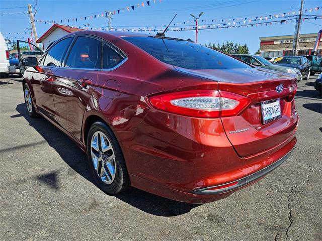 used 2014 Ford Fusion car, priced at $7,995
