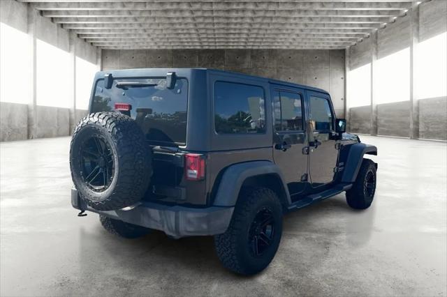 used 2015 Jeep Wrangler Unlimited car, priced at $19,999