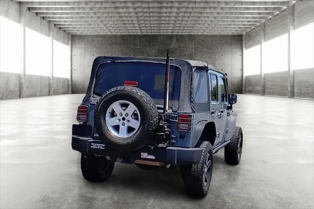 used 2015 Jeep Wrangler Unlimited car, priced at $18,799