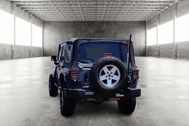 used 2015 Jeep Wrangler Unlimited car, priced at $18,799