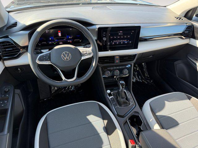 new 2025 Volkswagen Taos car, priced at $26,716