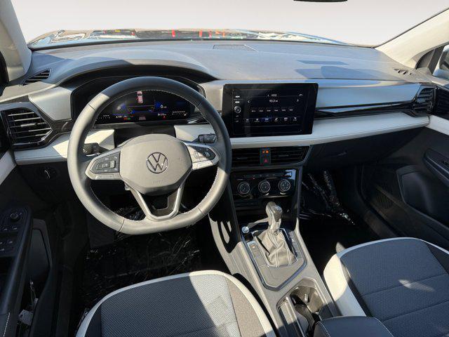 new 2025 Volkswagen Taos car, priced at $26,716