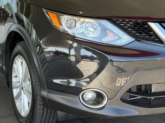 used 2019 Nissan Rogue Sport car, priced at $14,599