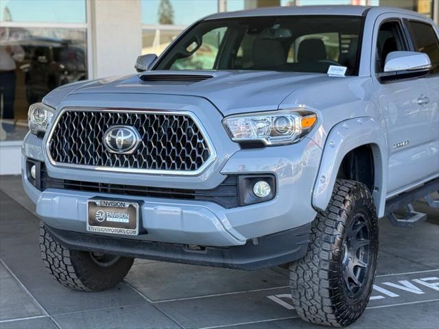 used 2018 Toyota Tacoma car, priced at $27,488