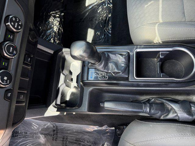used 2022 Toyota Tacoma car, priced at $25,188