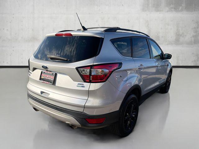 used 2018 Ford Escape car, priced at $13,634