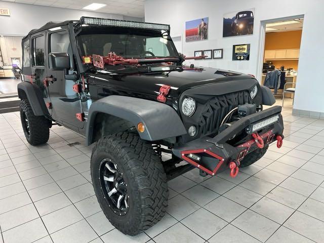 used 2017 Jeep Wrangler Unlimited car, priced at $16,549