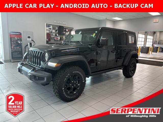 used 2023 Jeep Wrangler 4xe car, priced at $31,996