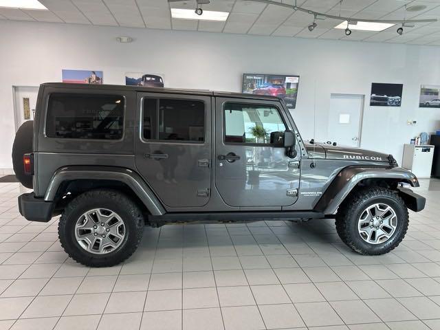 used 2016 Jeep Wrangler Unlimited car, priced at $26,676