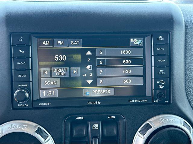 used 2016 Jeep Wrangler Unlimited car, priced at $21,264