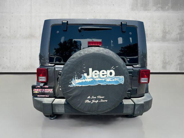 used 2016 Jeep Wrangler Unlimited car, priced at $21,264