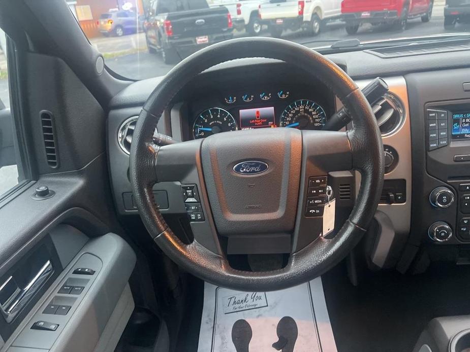 used 2014 Ford F-150 car, priced at $15,000