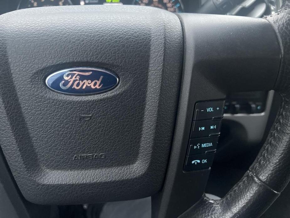 used 2014 Ford F-150 car, priced at $15,000