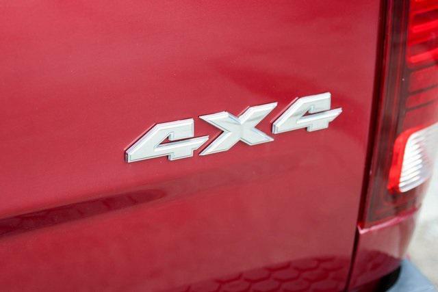 used 2018 Ram 1500 car, priced at $27,000