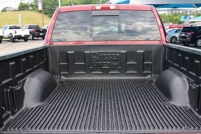 used 2018 Ram 1500 car, priced at $27,000
