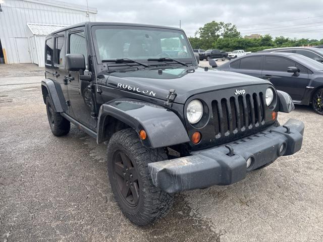used 2012 Jeep Wrangler Unlimited car, priced at $13,588