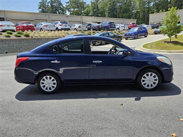 used 2012 Nissan Versa car, priced at $5,000