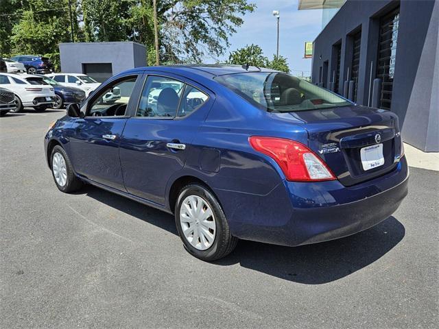 used 2012 Nissan Versa car, priced at $5,000