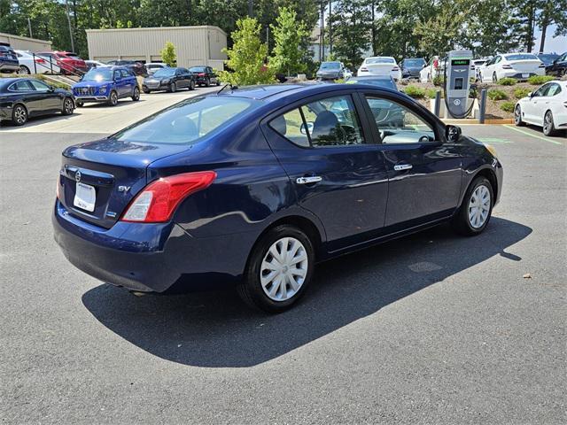 used 2012 Nissan Versa car, priced at $5,000