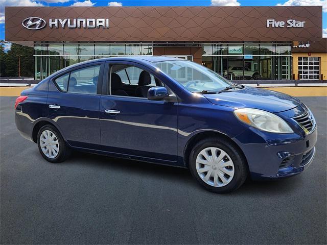 used 2012 Nissan Versa car, priced at $5,000