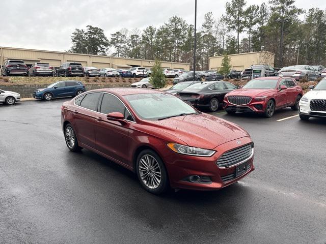 used 2014 Ford Fusion car, priced at $6,000