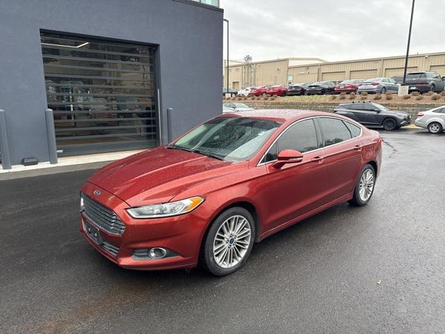 used 2014 Ford Fusion car, priced at $6,000