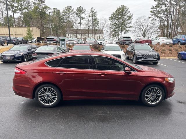 used 2014 Ford Fusion car, priced at $6,000